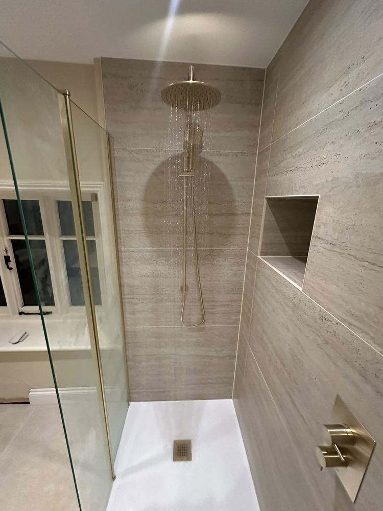 Rainfall shower head and handset in brushed brass