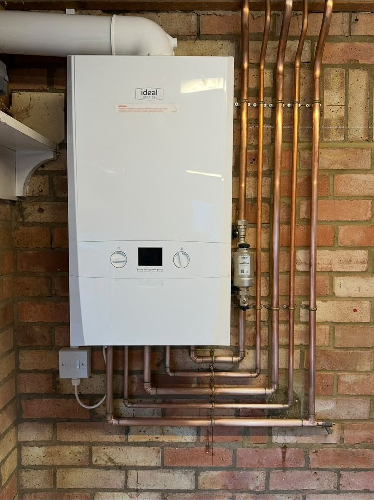 New Ideal combi boiler with copper pipework and a magnetic system filter