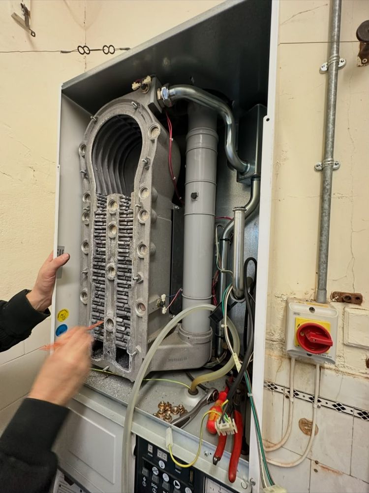 Boiler heat exchanger opened up for cleaning